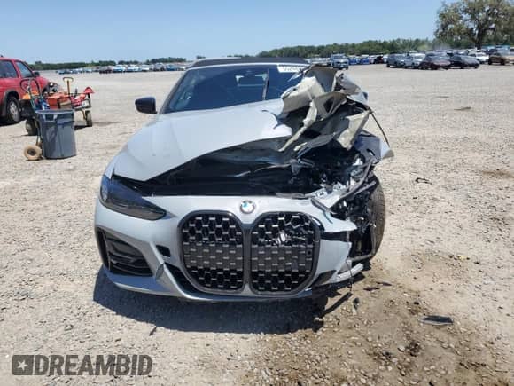 2022 BMW 4 Series 430i xDrive with VIN WBA43AT07NCJ20732, listed as a Copart auction lot 55248585 with 9,040 mi miles and Salvage title. Bid and sale history available at DreamBid. Image 5.