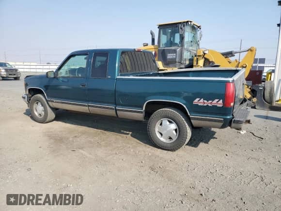 1998 Chevrolet Silverado 1500 with VIN 2GCEK19RXW1116889, listed as a Copart auction lot 70948515 with 238,720 mi miles and Salvage title. Bid and sale history available at DreamBid. Image 2.