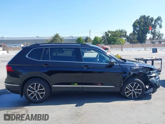 2021 Volkswagen Tiguan SE with VIN 3VV3B7AX4MM127236, listed as a IAAI auction lot 43100517 with 48,229 mi miles and . Bid and sale history available at DreamBid. Image 13.