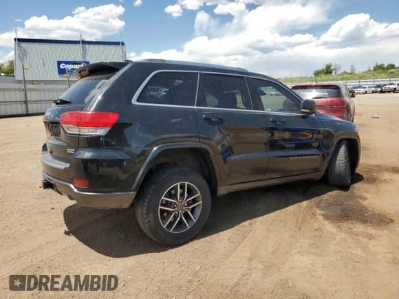 2018 Jeep Grand Cherokee Sterling with VIN 1C4RJFBT4JC181277, listed as a Copart auction lot 61384045 with 138,659 mi miles and Salvage title. Bid and sale history available at DreamBid. Image 3.