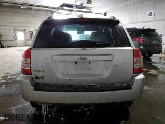 2010 Jeep Compass Latitude с VIN 1J4NF1FB8AD620344, выставлен на аукционе Copart как лот 88244265 с пробегом 169 861 миль миль и Чистый • Clean title. История ставок и продаж доступна на DreamBid. Изображение 6.