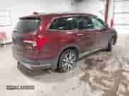 2021 Honda Pilot Touring 7-Passenger z VIN 5FNYF6H61MB044707, wystawiony jako IAAI lot #41548250 z przebiegiem 77 147 mil mil oraz . Historia ofert i sprzedaży dostępna na DreamBid. Obrazek 4.