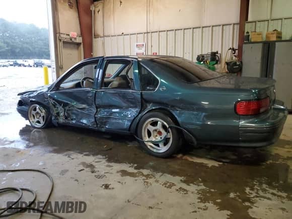 1995 Chevrolet Caprice с VIN 1G1BL52P6SR144277, выставлен на аукционе Copart как лот 72798924 с пробегом Не указан миль и Списание • Salvage title. История ставок и продаж доступна на DreamBid. Изображение 2.