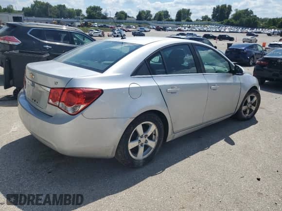 2013 Chevrolet Cruze LT with VIN 1G1PK5SB5D7320487, listed as a Copart auction lot 69843355 with 126,968 mi miles and Salvage title. Bid and sale history available at DreamBid. Image 3.