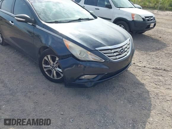 2013 Hyundai Sonata SE with VIN 5NPEC4AC6DH516305, listed as a IAAI auction lot 42763298 with 217,821 mi miles and . Bid and sale history available at DreamBid. Image 12.