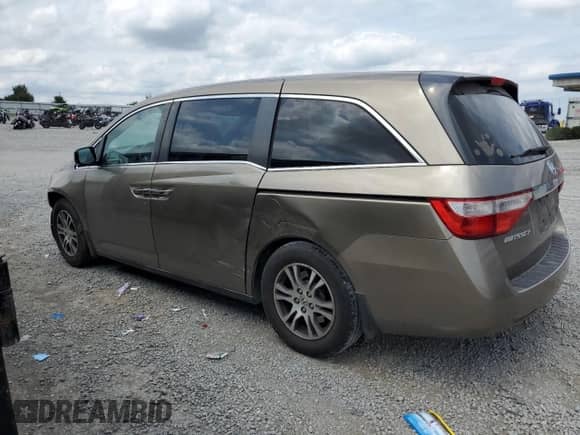 2012 Honda Odyssey EX with VIN 5FNRL5H48CB106771, listed as a Copart auction lot 69810795 with 140,290 mi miles and Salvage title. Bid and sale history available at DreamBid. Image 2.