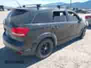 2013 Dodge Journey SXT with VIN 3C4PDCBB7DT729771, listed as a IAAI auction lot 42729241 with Not provided miles and . Bid and sale history available at DreamBid. Image 4.