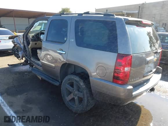 2014 Chevrolet Tahoe LTZ с VIN 1GNSKCE09ER154892, выставлен на аукционе IAAI как лот 41435673 с пробегом Не указан миль и . История ставок и продаж доступна на DreamBid. Изображение 3.