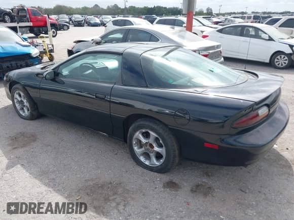 1998 Chevrolet Camaro Z28 z VIN 2G1FP22G2W2131930, wystawiony jako IAAI lot #41588098 z przebiegiem 24 866 mil mil oraz . Historia ofert i sprzedaży dostępna na DreamBid. Obrazek 3.