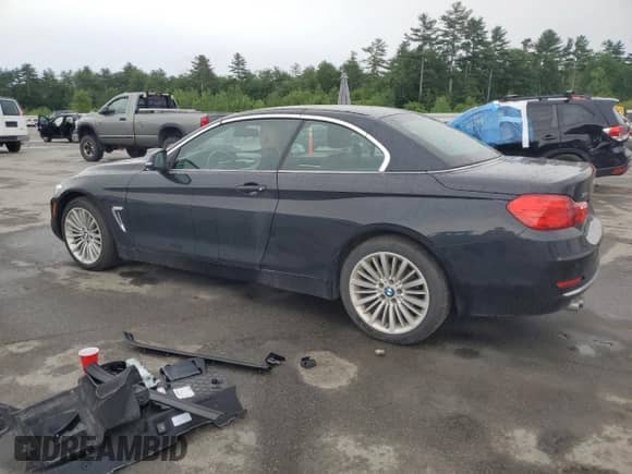2015 BMW 4 Series 428i xDrive with VIN WBA3T1C55FP820878, listed as a Copart auction lot 63287345 with 69,873 mi miles and Salvage title. Bid and sale history available at DreamBid. Image 2.
