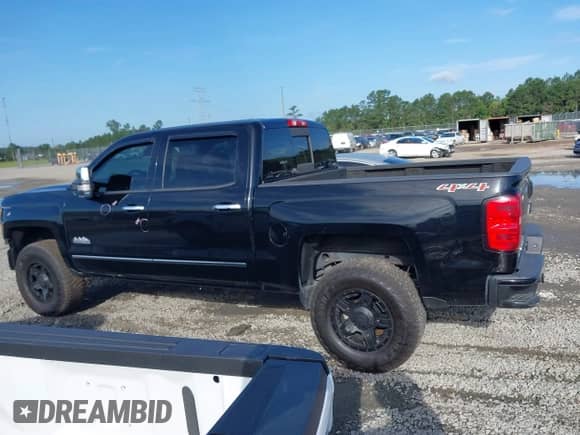 2014 Chevrolet Silverado 1500 High Country with VIN 3GCUKTEC7EG272127, listed as a IAAI auction lot 42465267 with 190,924 mi miles and . Bid and sale history available at DreamBid. Image 14.