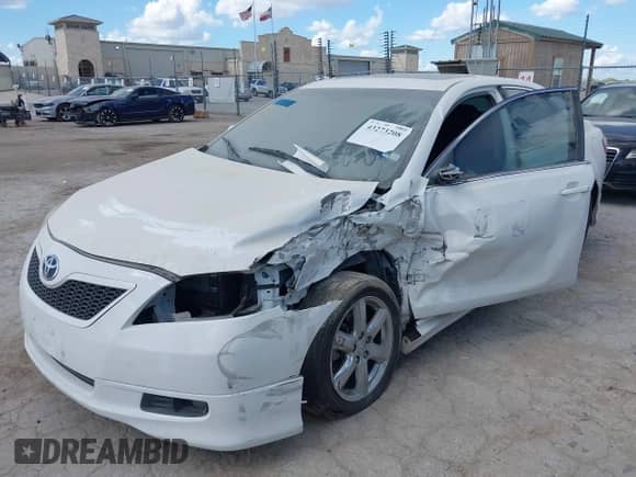 2009 Toyota Camry LE with VIN 4T1BE46K39U833660, listed as a IAAI auction lot 43273208 with 125,761 mi miles and . Bid and sale history available at DreamBid. Image 2.