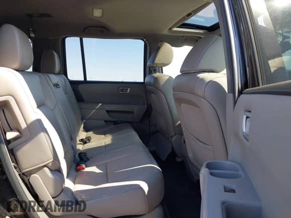 2013 Honda Pilot EX-L with VIN 5FNYF4H52DB011386, listed as a IAAI auction lot 43061878 with 195,846 mi miles and . Bid and sale history available at DreamBid. Image 8.