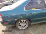 1994 Honda Accord LX z VIN 1HGCD5631RA068896, wystawiony jako IAAI lot #42552798 z przebiegiem 283 022 mil mil oraz . Historia ofert i sprzedaży dostępna na DreamBid. Obrazek 11.