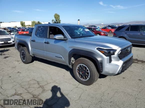 2024 Toyota Tacoma TRD Off Road with VIN 3TMLB5JN8RM000837, listed as a Copart auction lot 82183745 with 14,184 mi miles and Salvage title. Bid and sale history available at DreamBid. Image 4.