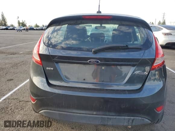 2011 Ford Fiesta SES with VIN 3FADP4FJ0BM109049, listed as a Copart auction lot 82098315 with 147,557 mi miles and Salvage title. Bid and sale history available at DreamBid. Image 6.