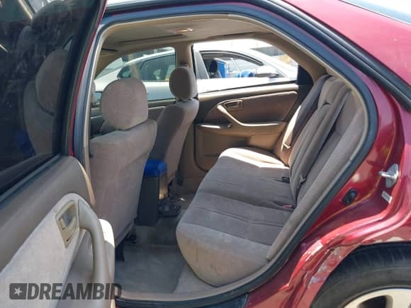 1997 Toyota Camry LE z VIN JT2BF22K9V0077628, wystawiony jako IAAI lot #42770453 z przebiegiem 257 721 mil mil oraz . Historia ofert i sprzedaży dostępna na DreamBid. Obrazek 8.