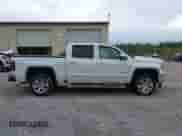 2018 GMC Sierra 1500 SLT z VIN 3GTU2NECXJG634683, wystawiony jako IAAI lot #43374368 z przebiegiem 76 104 mil mil oraz . Historia ofert i sprzedaży dostępna na DreamBid. Obrazek 13.