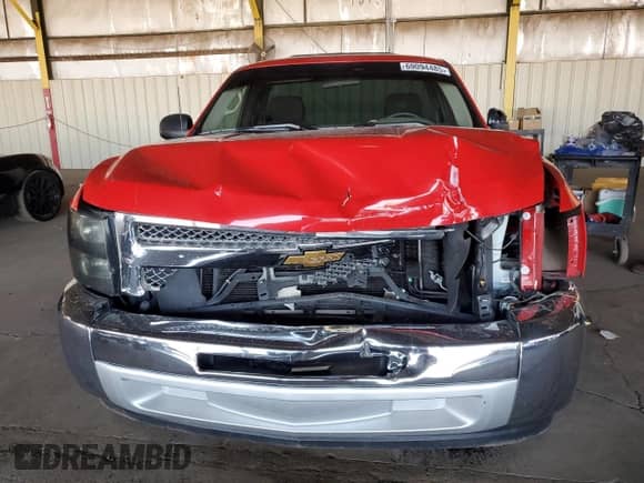2013 Chevrolet Silverado 1500 Work Truck z VIN 1GCNCPEX5DZ167550, wystawiony jako Copart lot #69094485 z przebiegiem 127 937 mil mil oraz Szkoda całkowita • Salvage title. Historia ofert i sprzedaży dostępna na DreamBid. Obrazek 5.