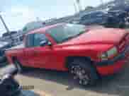 1999 Dodge Dakota SLT z VIN 1B7GL22X2XS129464, wystawiony jako IAAI lot #41975506 z przebiegiem 99 437 mil mil oraz . Historia ofert i sprzedaży dostępna na DreamBid. Obrazek 13.