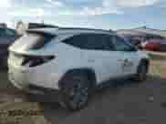 2022 Hyundai Tucson Blue with VIN KM8JBCA11NU066804, listed as a Copart auction lot 80804165 with 80,081 mi miles and Salvage title. Bid and sale history available at DreamBid. Image 3.