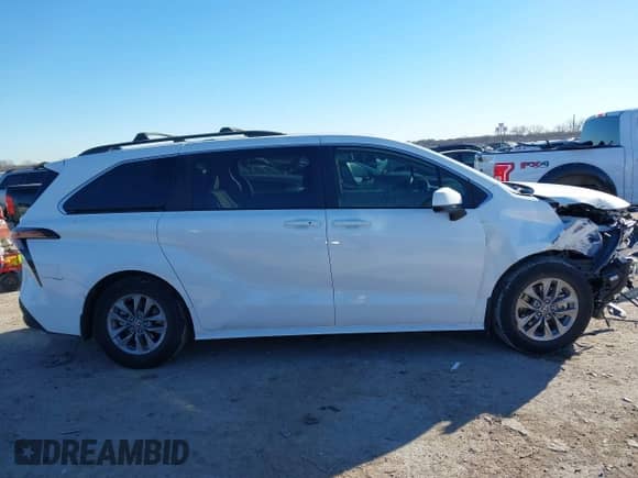 2024 Toyota Sienna LE with VIN 5TDBRKEC0RS217006, listed as a IAAI auction lot 41389239 with 23,983 mi miles and . Bid and sale history available at DreamBid. Image 13.