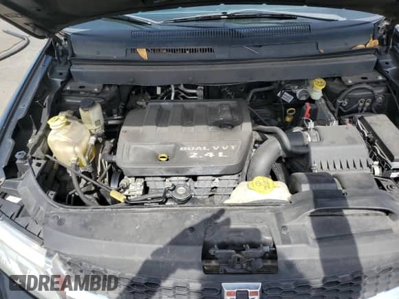 2015 Dodge Journey American Value with VIN 3C4PDCAB2FT644972, listed as a Copart auction lot 64377425 with 131,776 mi miles and Salvage title. Bid and sale history available at DreamBid. Image 12.