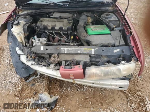 1999 Saturn SL with VIN 1G8ZH5288XZ139499, listed as a Copart auction lot 71115484 with 254,290 mi miles and Salvage title. Bid and sale history available at DreamBid. Image 12.