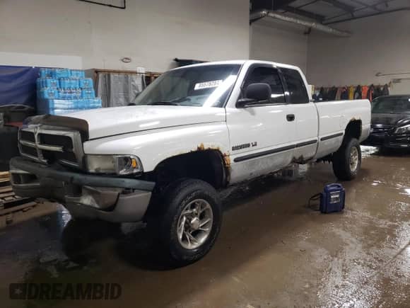 1999 Dodge RAM with VIN 3B7KF22W6XG119925, listed as a Copart auction lot 85578284 with 144,278 mi miles and Salvage title. Bid and sale history available at DreamBid. Image 1.