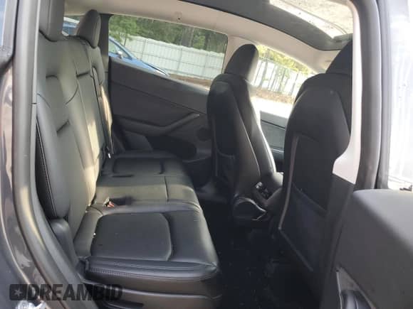 2023 Tesla Model Y Long Range with VIN 7SAYGAEE4PF668889, listed as a Copart auction lot 67239314 with 26,874 mi miles and Salvage title. Bid and sale history available at DreamBid. Image 10.