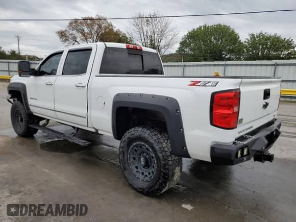 2018 Chevrolet Silverado 2500HD LTZ z VIN 1GC1KWEG4JF208534, wystawiony jako Copart lot #85362345 z przebiegiem 104 051 mil mil oraz Szkoda całkowita • Salvage title. Historia ofert i sprzedaży dostępna na DreamBid. Obrazek 2.