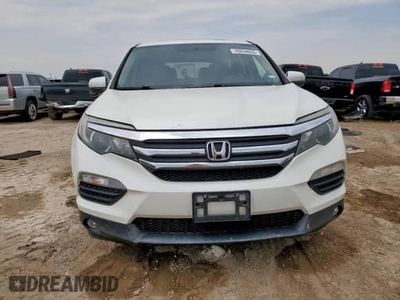 2016 Honda Pilot EX-L z VIN 5FNYF6H58GB057384, wystawiony jako Copart lot #70254655 z przebiegiem 136 481 mil mil oraz Czysty tytuł • Clean title. Historia ofert i sprzedaży dostępna na DreamBid. Obrazek 5.
