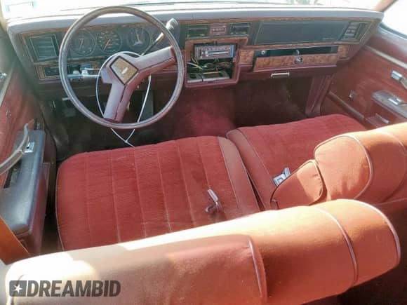 1984 Chevrolet Caprice with VIN 1G1AN35H0EX157721, listed as a Copart auction lot 58846105 with 54,741 mi miles and Salvage title. Bid and sale history available at DreamBid. Image 8.