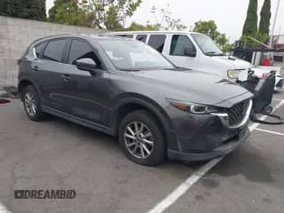 2022 Mazda CX-5 S Select z VIN JM3KFBBM2N0573466, wystawiony jako IAAI lot #42604117 z przebiegiem 35 729 mil mil oraz . Historia ofert i sprzedaży dostępna na DreamBid. Obrazek 1.