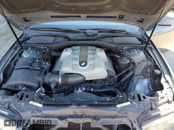 2004 BMW 7 Series 745i z VIN WBAGL63534DP73170, wystawiony jako Copart lot #64250965 z przebiegiem 90 716 mil mil oraz Czysty tytuł • Clean title. Historia ofert i sprzedaży dostępna na DreamBid. Obrazek 11.