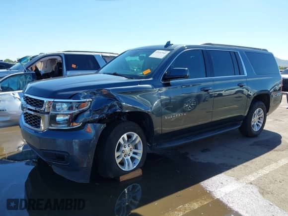 2019 Chevrolet Suburban LS z VIN 1GNSCGKC4KR244725, wystawiony jako IAAI lot #43452942 z przebiegiem 65 997 mil mil oraz . Historia ofert i sprzedaży dostępna na DreamBid. Obrazek 6.