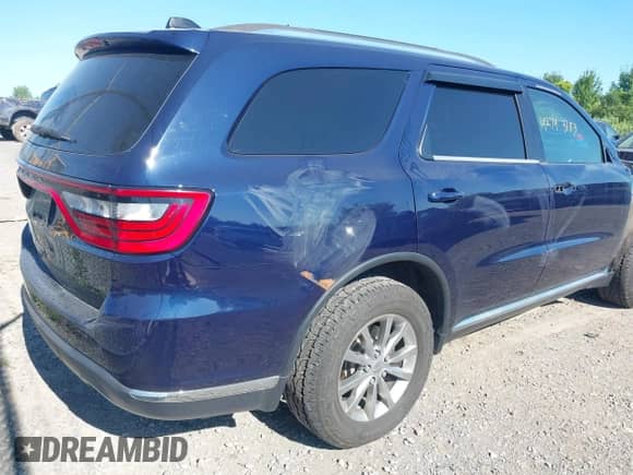 2017 Dodge Durango SXT with VIN 1C4RDJAGXHC790978, listed as a IAAI auction lot 42793183 with 132,146 mi miles and . Bid and sale history available at DreamBid. Image 4.