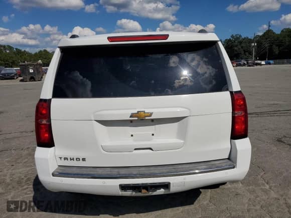 2015 Chevrolet Tahoe LTZ с VIN 1GNSKCKC0FR139651, выставлен на аукционе Copart как лот 81580235 с пробегом Не указан миль и Списание • Salvage title. История ставок и продаж доступна на DreamBid. Изображение 6.