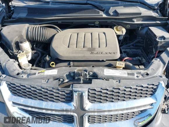 2019 Dodge Grand Caravan SE z VIN 2C4RDGBGXKR727315, wystawiony jako IAAI lot #41770222 z przebiegiem 97 561 mil mil oraz . Historia ofert i sprzedaży dostępna na DreamBid. Obrazek 10.