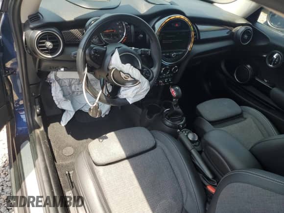 2015 MINI Hardtop S с VIN WMWXP7C54FT740648, выставлен на аукционе Copart как лот 55412595 с пробегом 51 810 миль миль и Списание • Salvage title. История ставок и продаж доступна на DreamBid. Изображение 8.