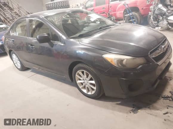 2013 Subaru Impreza Premium with VIN JF1GJAC65DH027189, listed as a IAAI auction lot 42331824 with 141,389 mi miles and . Bid and sale history available at DreamBid. Image 1.