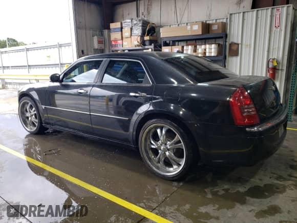 2005 Chrysler 300 C with VIN 2C3AA63H45H597778, listed as a Copart auction lot 83850975 with 128,599 mi miles and Salvage title. Bid and sale history available at DreamBid. Image 2.