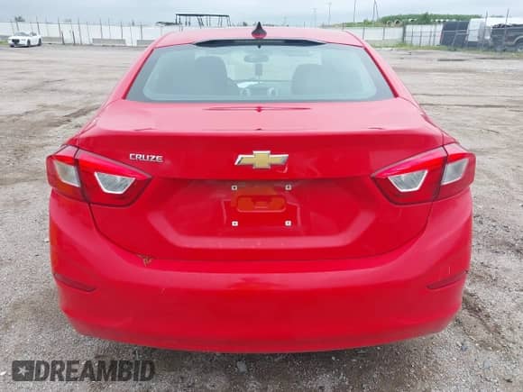 2018 Chevrolet Cruze LS z VIN 1G1BC5SMXJ7100220, wystawiony jako IAAI lot #42800342 z przebiegiem 69 739 mil mil oraz . Historia ofert i sprzedaży dostępna na DreamBid. Obrazek 17.