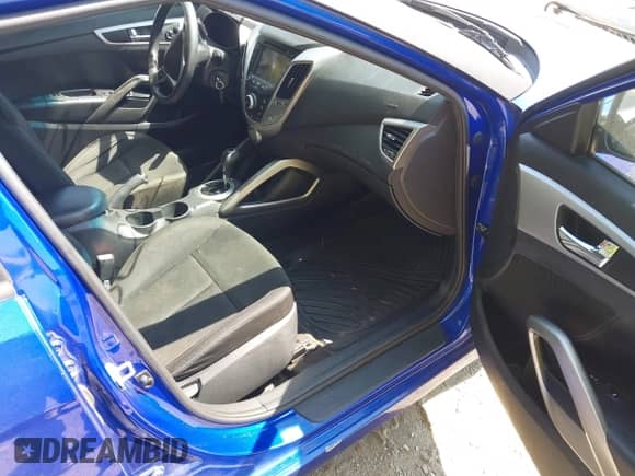 2014 Hyundai Veloster с VIN KMHTC6AD7EU198077, выставлен на аукционе IAAI как лот 43220953 с пробегом 152 364 миль миль и . История ставок и продаж доступна на DreamBid. Изображение 5.