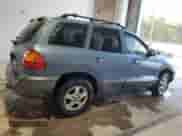 2003 Hyundai Santa Fe GLS z VIN KM8SC73D23U373492, wystawiony jako Copart lot #75107684 z przebiegiem 205 655 mil mil oraz Szkoda całkowita • Salvage title. Historia ofert i sprzedaży dostępna na DreamBid. Obrazek 3.