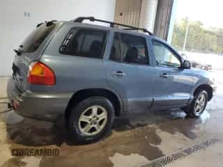 2003 Hyundai Santa Fe GLS z VIN KM8SC73D23U373492, wystawiony jako Copart lot #75107684 z przebiegiem 205 655 mil mil oraz Szkoda całkowita • Salvage title. Historia ofert i sprzedaży dostępna na DreamBid. Obrazek 3.