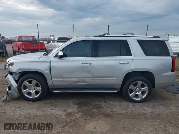 2015 Chevrolet Tahoe LTZ with VIN 1GNSKCKC8FR564678, listed as a IAAI auction lot 43238626 with 161,656 mi miles and . Bid and sale history available at DreamBid. Image 14.