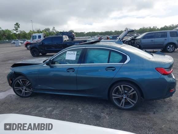 2020 BMW 3 Series 330i with VIN 3MW5R1J0XL8B39110, listed as a IAAI auction lot 43425538 with Not provided miles and . Bid and sale history available at DreamBid. Image 14.