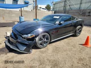 2021 Ford Mustang GT с VIN 1FA6P8CF0M5140617, выставлен на аукционе Copart как лот 71715285 с пробегом 57 974 миль миль и Списание • Salvage title. История ставок и продаж доступна на DreamBid. Изображение 1.