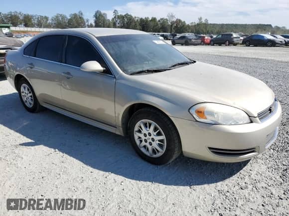 2010 Chevrolet Impala Police Police with VIN 2G1WD5EM8A1233498, listed as a Copart auction lot 74896924 with 143,852 mi miles and Salvage title. Bid and sale history available at DreamBid. Image 4.